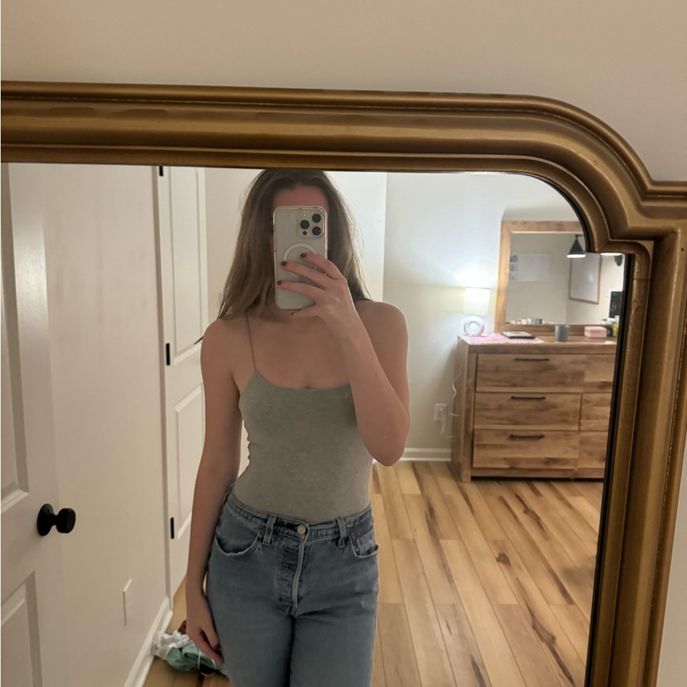 Grey body suit